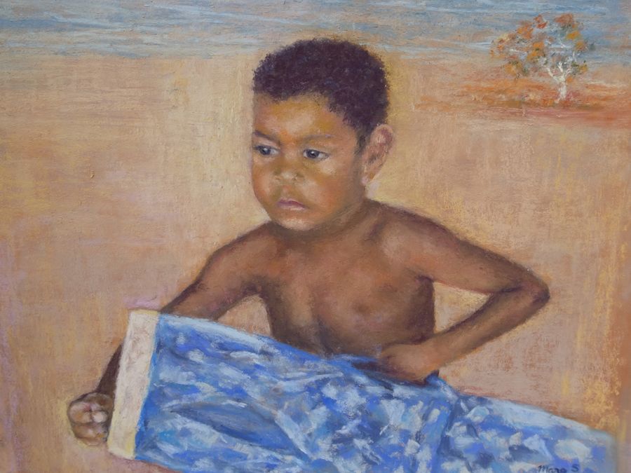 Indigenous boy painting -with drum